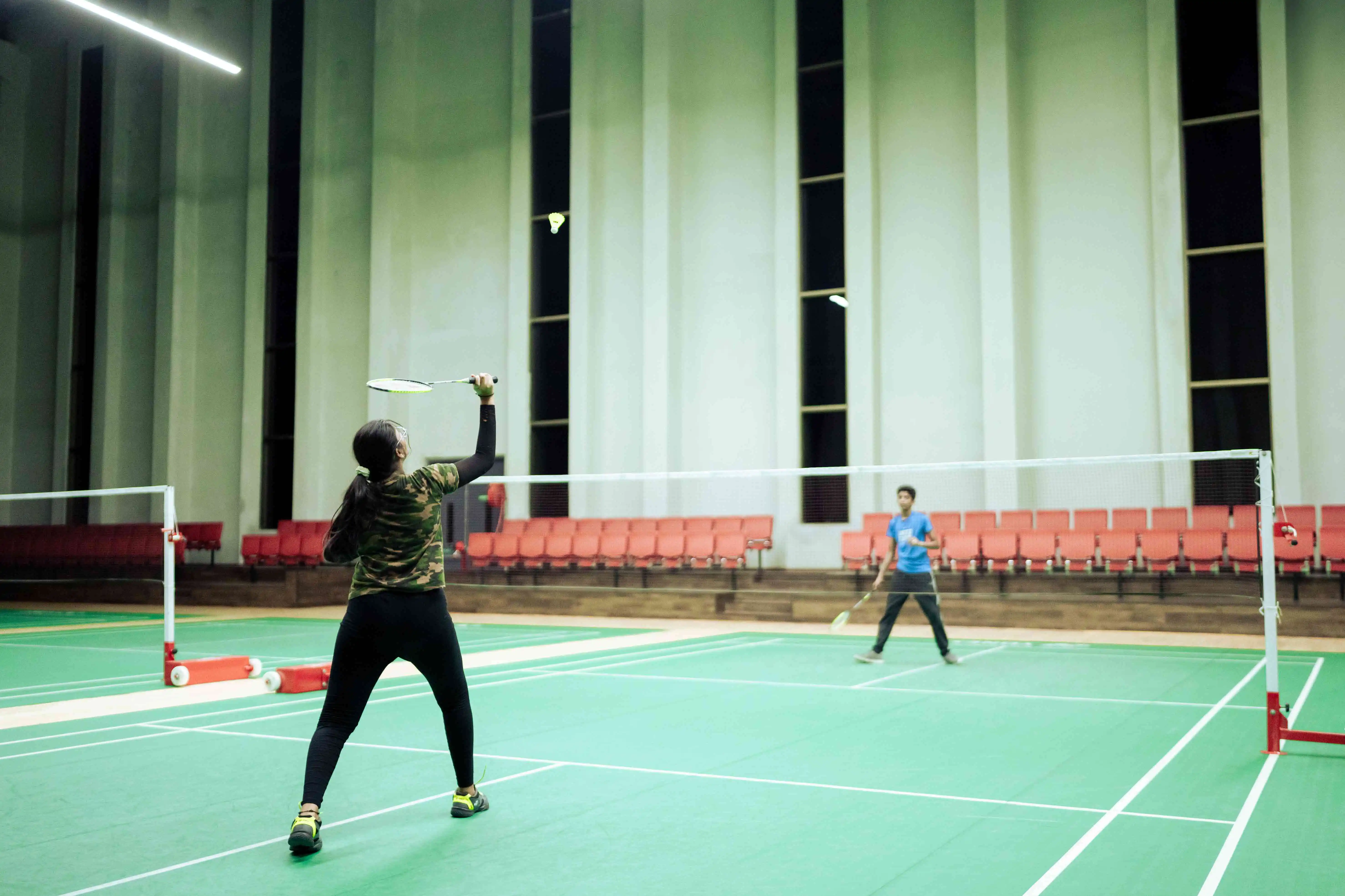 Indoor badminton court and playing surface